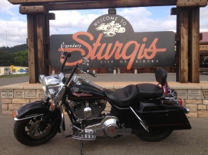 V-Twin Life - Road King at the Sturgis sign